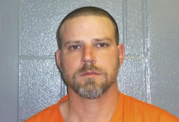 This Dec. 9, 2015, booking photo provided by the Custer County, Okla., Sheriff's Office shows Jeremy Doss Hardy, who was arrested for DUI after a brief pursuit on Interstate 40 in Custer County, Okla. Oklahoma state police say Hardy, jailed on a preliminary complaint of driving under the influence, is the "only person'" being investigated for a pair of suspected road rage killings along Interstate 40. Jessica Brown, Oklahoma State Bureau of Investigation spokeswoman, said Hardy and his vehicle are the ones described by victims and witnesses as the suspect vehicle involved in the shootings. (Custer County Sheriff's Office via AP)