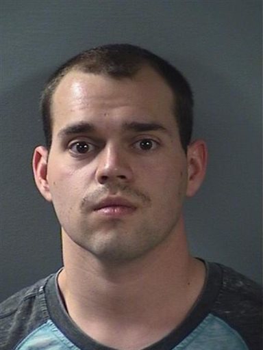 This undated photo provided by the Coralville Police Department shows Alexander Matthew Kozak, who has been charged with first-degree murder in a shooting that occurred Friday, June 12, 2015, inside Coral Ridge Mall near its food court. The woman shot and killed in the eastern Iowa shopping mall was a 20-year-old employee of a children's museum inside the mall and knew the man who shot her, authorities said on Saturday during a news conference. (Coralville Police Department via AP) MANDATORY CREDIT