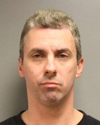 Robert James Talbot Jr, 42, is accused by federal authorities in Houston of plotting to blow up government buildings and kill police officers as part of the American Insurgent Movement.